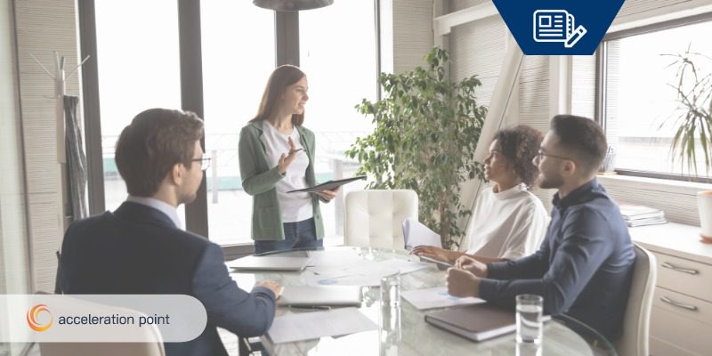 employees having a team meeting